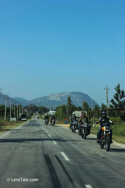 Bikers From Nandi Hills..... Oh Cool.... We met some bikers on the way to Nandi hills. A bike ride to Nandi hills a cool option. You can also see the lon sight view hills in the image